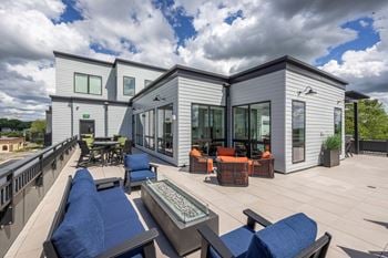 Sky lounge with large warming kitchen, fireplace, seating areas, tv's, fire pits and panoramic lake views