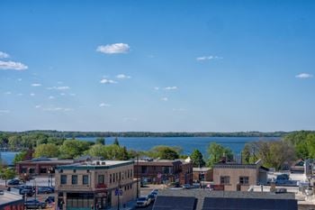 Sky lounge with large warming kitchen, fireplace, seating areas, tv's, fire pits and panoramic lake views
