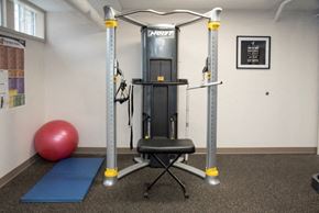 Minneapolis apartment for rent - a gym bench with a fitness ball and mat in the corner of a room