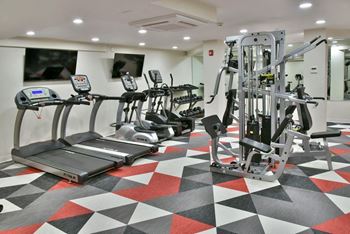 Fully equipped fitness center at eagan place apartments