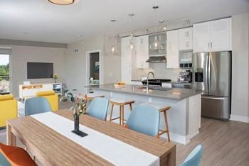 Classic white designer cabinetry with soft-close drawers