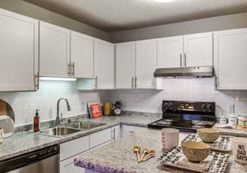 Open kitchen with wrap-around counters