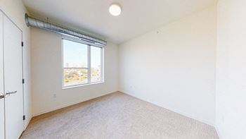 A room with a carpeted floor