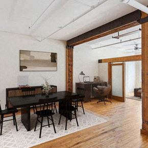 Minneapolis apartment for rent - A dining room with a black table and chairs.at Lee Lofts, Minnesota