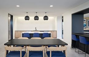 Minneapolis apartment for rent - Dining Area with a Large Table at Peregrine Apartments, Minneapolis