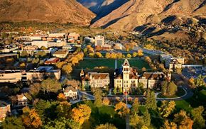 Logan townhouse for rent - aerial view of USU campus with mountains