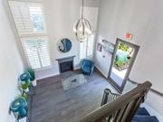 Canoga Park apartment for rent - a view of a living room from the top of a staircase at Warner Center Townhomes, California, 91303