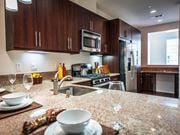Oxnard apartment for rent - a kitchen with a sink and a counter top at The Vines at Riverpark, LLC, California, 93036