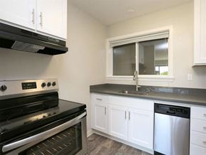 Sausalito apartment for rent - a kitchen with a stove and a sink and a window at The Pier at Sausalito, Sausalito
