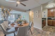 Woodland Hills apartment for rent - a dining room and kitchen with a table and chairs at City View Apartments at Warner Center, Woodland Hills, CA 91367