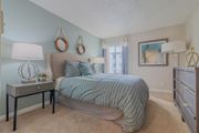 Woodland Hills apartment for rent - a bedroom with a large bed and a window