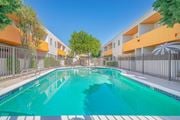 Sherman Oaks apartment for rent - a swimming pool in front of an apartment building with a pool at The Flats on Addison, California, 91423