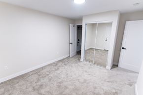 Sherman Oaks apartment for rent - empty bedroom with a mirrored closet  at The Flats on Addison, Sherman Oaks