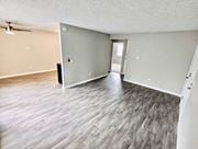 El Cajon apartment for rent - an empty living room with a hard wood floor at The Arches Apartments, LLC, El Cajon, CA 92021