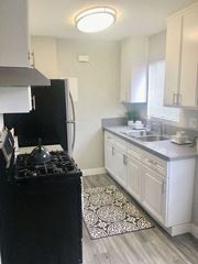 Los Angeles apartment for rent - a kitchen with a stove and a sink  at The Marq Apartments LLC, Los Angeles, California