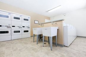 Campbell apartment for rent - a kitchen with white appliances and a counter with two sinks at Campbell West, California