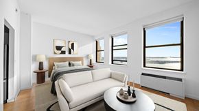 New York apartment for rent - A bedroom with a large bed and a couch. at One West,New York, NY