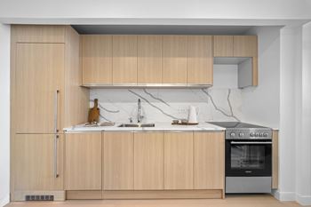 Fully furnished kitchen at one west,new york, ny