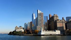 New York apartment for rent - A city skyline with a large  building in the middle at Aria, New York, 10038