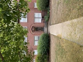 Birmingham apartment for rent - a view of a brick building from above with trees