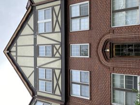 Birmingham apartment for rent - the side of a building with a triangular facade and windows