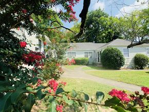 Birmingham apartment for rent - a white house with a sidewalk in front of it