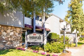 Concord apartment for rent - The Sequoah Apartments sign is in front of a stone building.