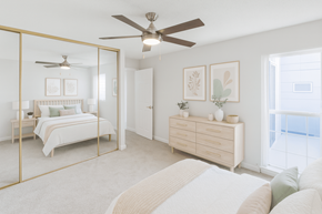 Concord apartment for rent - A bedroom with a bed, dresser, and mirror.
