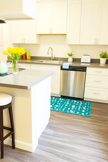 Concord apartment for rent - A kitchen with a white counter and a stainless steel dishwasher.