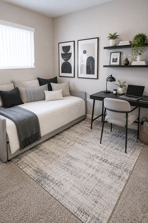 Livermore apartment for rent - A bedroom with a bed, desk, and chair.