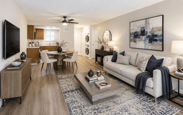 Concord apartment for rent - A living room with a white couch and a coffee table.