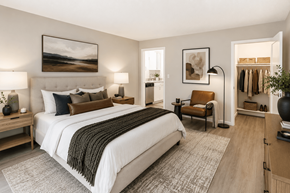 Concord apartment for rent - A bedroom with a large bed and a chair.