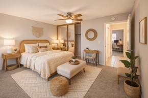 Walnut Creek apartment for rent - A bedroom with a large bed and a ceiling fan.