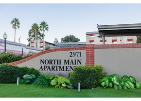Walnut Creek apartment for rent - A sign for North Main Apartment 2971 is displayed in front of a building.