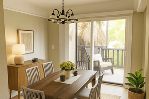 Pleasant Hill apartment for rent - A dining room with a wooden table and chairs.