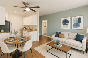 Fremont apartment for rent - A modern dining room with a wooden table and white chairs.