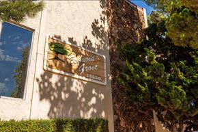 San Leandro apartment for rent - a building with a sign on the side of it