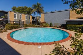 Concord apartment for rent - A small pool surrounded by a brick border.