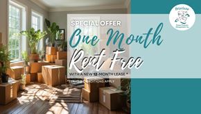 Toronto apartment for rent - A room with boxes on the floor and a sign offering a one month rent free deal.