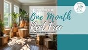 Thornhill apartment for rent - A room with boxes on the floor and a sign offering a one month rent free deal.