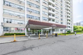 North York apartment for rent - The image shows a large apartment building with the number 4415 on it.