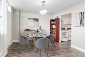 North York apartment for rent - A dining room with a table set for four.