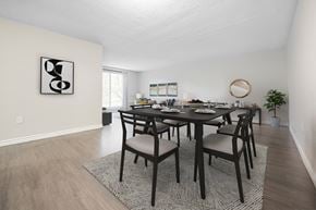 London apartment for rent - A dining room with a table set for six.
