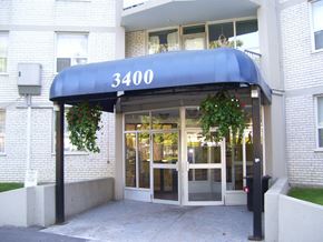 North York apartment for rent - The entrance to a building with the number 3400 on the awning.