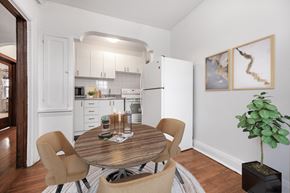 Toronto apartment for rent - A dining room with a table and chairs.