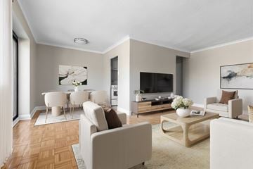 Toronto apartment for rent - A living room with a white sofa set and a wooden coffee table.