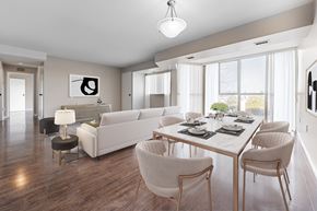 London apartment for rent - A modern dining room with a white table and chairs.