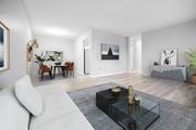 London apartment for rent - A modern living room with a white sofa and a glass coffee table.