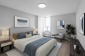 Lindsay apartment for rent - A bedroom with a large bed and a painting on the wall.