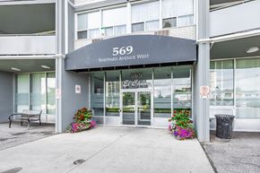 North York apartment for rent - The front of a building with the number 569 on it.